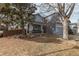 Beautiful two-story home featuring a welcoming front porch, attractive landscaping, and a two-car garage at 9745 Merimbula St, Highlands Ranch, CO 80130