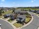 Aerial view of a neighborhood featuring well-maintained homes and landscaping with mountain views at 3495 Amber Sun Cir, Castle Rock, CO 80108