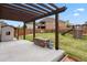 Backyard featuring a pergola, fire pit, playset, and fenced yard at 3495 Amber Sun Cir, Castle Rock, CO 80108