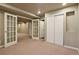 Carpeted basement featuring french doors, a closet with sliding doors, and recessed lighting at 3495 Amber Sun Cir, Castle Rock, CO 80108