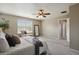 A bright bedroom has lots of natural light and ceiling fan at 3495 Amber Sun Cir, Castle Rock, CO 80108
