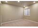 Cozy bedroom with neutral walls, carpeted floors, window with blinds, and recessed lights at 3495 Amber Sun Cir, Castle Rock, CO 80108
