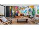 Chic living room with a colorful mural, hardwood floors, and stylish seating at 3275 W Hawthorne Pl, Denver, CO 80221