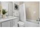 Clean bathroom with a shower-tub combination, bright vanity, and neutral color palette at 3040 Wilson Ct # 2, Denver, CO 80205