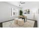 Bright home office featuring a work desk, natural light, and modern décor, perfect for a productive workspace at 3040 Wilson Ct # 2, Denver, CO 80205