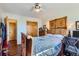 A bedroom with hardwood floors, a desk, and a window at 1175 N Emerson St # 312, Denver, CO 80218