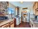 Functional kitchen with a view and granite countertops at 1175 N Emerson St # 312, Denver, CO 80218