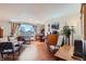 Bright, hardwood living room with a large window overlooking the city, great for entertaining or relaxing at 1175 N Emerson St # 312, Denver, CO 80218