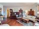 Elegant living room featuring hardwood floors, comfortable seating, and ample natural light perfect for relaxation at 1175 N Emerson St # 312, Denver, CO 80218