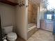 Well-lit bathroom features a tiled shower-over-tub and updated vanity at 925 N Lincoln St # 14C, Denver, CO 80203