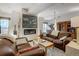 A beautifully appointed living room featuring a cozy fireplace, stylish decor, and comfortable seating at 925 N Lincoln St # 14C, Denver, CO 80203