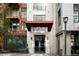 View of the entryway to the Jack Kerouac Lofts building at 3100 Huron St # 1B, Denver, CO 80202