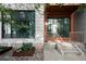 Close exterior view showcasing unique architectural details and landscaping elements at 3100 Huron St # 1B, Denver, CO 80202