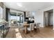 Dining room with balcony access; view of fireplace, stairs, and great outdoor vista at 4261 Ridgewalk Pt, Castle Rock, CO 80108