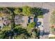 Aerial view of a house showing the roof, yard, driveway, and street access at 15000 W 29Th Ave, Golden, CO 80401