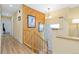 Hallway with wood accents, stairs to the second level, and natural light at 15000 W 29Th Ave, Golden, CO 80401