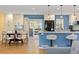 Open concept kitchen and dining area with stainless steel appliances at 15000 W 29Th Ave, Golden, CO 80401