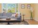 Cozy living room with comfortable seating and a sun-filled window view at 15000 W 29Th Ave, Golden, CO 80401