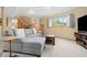 Finished basement living room with sectional couch and modern decor at 15000 W 29Th Ave, Golden, CO 80401