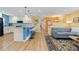 Inviting living space with stylish seating and a direct view to the breakfast bar at 15000 W 29Th Ave, Golden, CO 80401