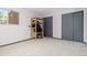 Simple room with extra storage and a window for light at 15000 W 29Th Ave, Golden, CO 80401