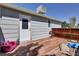 The light blue exterior features a wooden deck at 17825 E Carolina Pl, Aurora, CO 80017