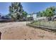 Spacious backyard featuring play structures and fencing, offering room for outdoor activities and recreation at 17825 E Carolina Pl, Aurora, CO 80017