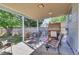 Covered patio with outdoor furniture and playhouse, perfect for entertaining and outdoor relaxation at 17825 E Carolina Pl, Aurora, CO 80017