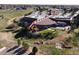 Aerial view of the Carpenter Recreation Center, showing the building's unique architecture and outdoor playground at 3308 E 118Th Way, Thornton, CO 80233
