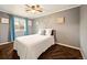 Cozy bedroom featuring plush carpet, natural light, and a serene color scheme creating a relaxing space at 3308 E 118Th Way, Thornton, CO 80233