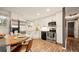 Eat-in kitchen features stainless steel appliances and hardwood flooring at 3308 E 118Th Way, Thornton, CO 80233