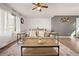 Inviting living room features a ceiling fan and stylish decor at 3308 E 118Th Way, Thornton, CO 80233