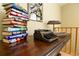 Desk with typewriter, books, and decor showcasing a cozy and stylish workspace at 446 Blue River Rd, Breckenridge, CO 80424