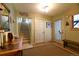 Inviting foyer features hardwood floors, a staircase, and convenient access to various areas of the home at 446 Blue River Rd, Breckenridge, CO 80424