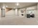 Spacious finished basement area with neutral carpeting, offering versatile living and entertainment space at 6530 Ridgeview Dr, Morrison, CO 80465