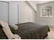 Cozy bedroom with a large bed and a window, perfect for a relaxing retreat with lots of light at 6530 Ridgeview Dr, Morrison, CO 80465