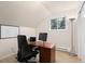 Bright office space with a desk, chair, and natural light, ideal for work and productivity at 6530 Ridgeview Dr, Morrison, CO 80465