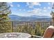 Breathtaking mountain view from the deck, perfect for relaxation and enjoying the natural scenery at 6530 Ridgeview Dr, Morrison, CO 80465