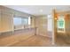 Walk-in closet offering generous storage with built-in shelving and windows for natural light at 6684 E Bates Ave, Denver, CO 80224