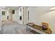 Finished basement area with neutral carpeting and multiple entrances at 2716 N Columbine St, Denver, CO 80205