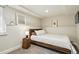 Nicely finished bedroom with a large window and soft lighting at 2716 N Columbine St, Denver, CO 80205