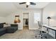 Cozy home office or bedroom space with a closet, desk, and inviting seating area at 2716 N Columbine St, Denver, CO 80205