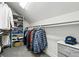 Functional walk-in closet with ample hanging space and shelving for organized storage at 2716 N Columbine St, Denver, CO 80205