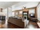 Spacious living room featuring a brick wall, fireplace, and comfortable seating at 2716 N Columbine St, Denver, CO 80205