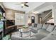 Cozy living room featuring a comfortable sectional sofa, stylish decor, and a fireplace at 2716 N Columbine St, Denver, CO 80205
