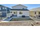 View of the backyard with patio, grill, outdoor sofa, and a well-maintained lawn at 4327 Wilson Peak Dr, Castle Rock, CO 80104