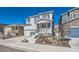 Charming two-story home with a well-manicured front yard and attached garage at 4327 Wilson Peak Dr, Castle Rock, CO 80104