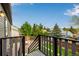 Great backyard view featuring lush greenery and a charming fire pit area at 19661 E Girard Ave, Aurora, CO 80013