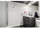 Modern bathroom with a sleek vanity, updated fixtures, and tiled shower at 19661 E Girard Ave, Aurora, CO 80013