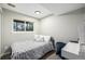 Small bedroom featuring natural light and a dedicated desk space at 19661 E Girard Ave, Aurora, CO 80013